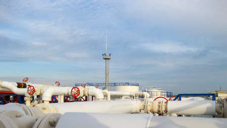 Pipes over Gasoline air coolers. Oil refinery. Equipment for primary oil refining.