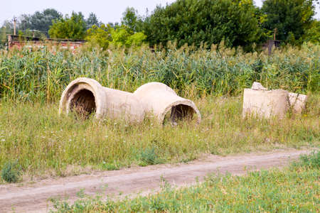 The excavated concrete pipes of locks of the irrigation rice system.の写真素材