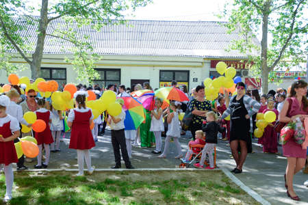 Slavyansk-on-Kuban, Russia - May 1, 2018: Celebrating the first of May, the day of spring and work. May Day parade on the Theater Square in the city of Slavyansk-on-Kuban.のeditorial素材