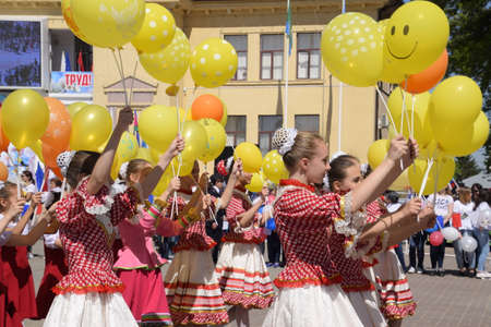 Slavyansk-on-Kuban, Russia - May 1, 2018: Celebrating the first of May, the day of spring and work. May Day parade on the Theater Square in the city of Slavyansk-on-Kuban.のeditorial素材