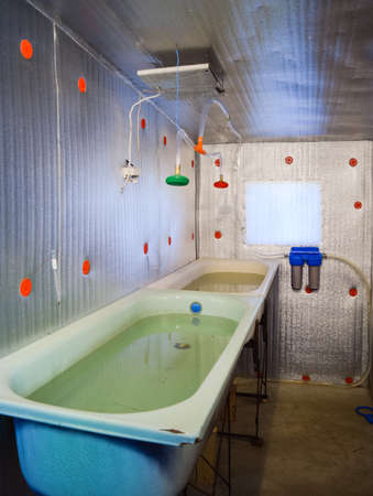 A room for growing fish fry. Bath for the fry. A fish-nursery.の写真素材