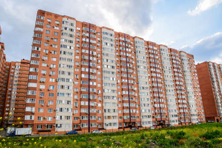 New storey residential building on the city street. Residential houses.