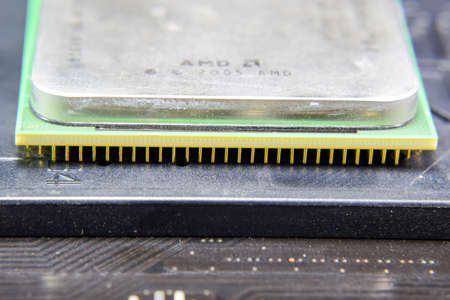 Computer processor, contact feet. Electronic board with electrical components. Electronics of...