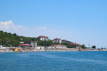 Novorossiysk, Russia - August 06, 2018: Shirokaya Balka Sea beach near the city of Novorossiysk. Infrastructure of the beach. Holidaymakers on the beach.のeditorial素材
