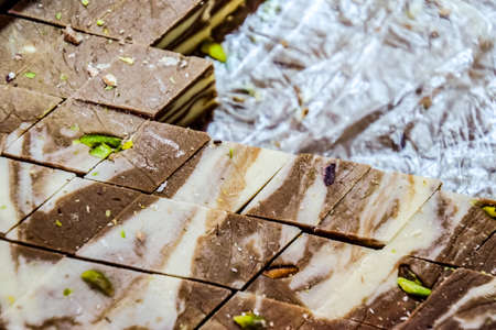 Diamond-cut, chocolate nougat. Eastern sweets. Curd cake Indian sweetsの写真素材