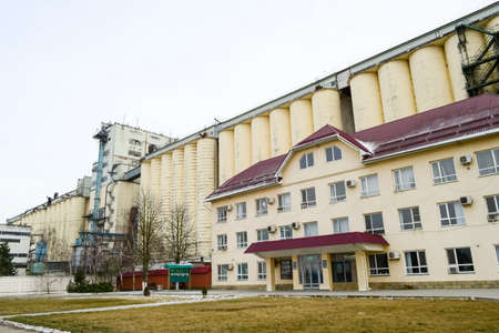 Slavyansk-on-Kuban, Russia - January 27, 2016: Building for storing and drying grain. Soviet-built elevator.のeditorial素材