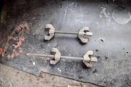Screws for springs. A device for tightening springsの写真素材
