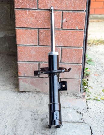 Car strut. Front shock absorber of a car.