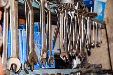 Krasnodar, Russia - October 18, 2017: Wrenches and other tools in the car garage.のeditorial素材