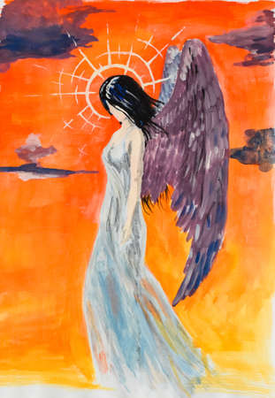 Angel girl with brown wings, in a gray dress and a luminous nimbusの写真素材