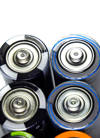 Salt and alkaline batteries, a source of energy for portable technology. AAA and AA batteriesの写真素材