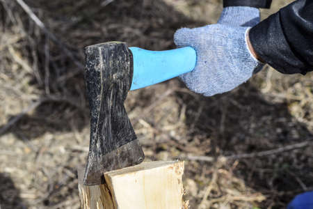 Chopping wood with an ax. Chopping woodの写真素材