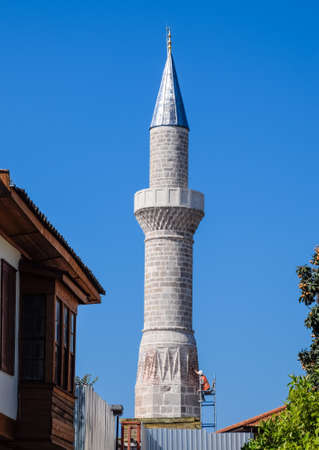 Whitewash minaret mosque. Repair of the construction of the cult of Islam.の写真素材