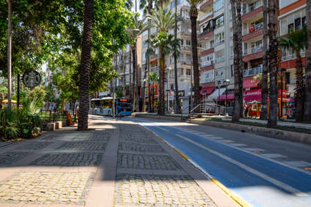 Antalya, Turkey - May 19, 2019: The streets of Antalya, roadway and cycle paths with pedestrian sidewalks.のeditorial素材
