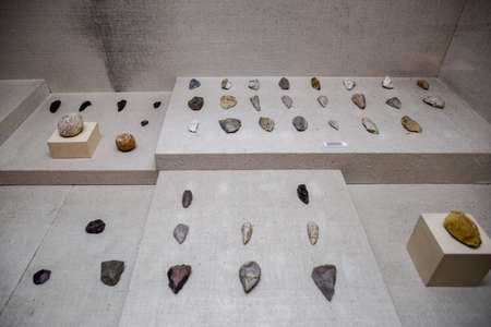 Antalya, Turkey - May 20, 2019: stone tools and knives with scrapers. Exhibits of the Antalya Museum of Antiquities, stone scrapers and knives and pottery.のeditorial素材