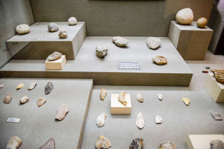 Antalya, Turkey - May 20, 2019: stone tools and knives with scrapers. Exhibits of the Antalya Museum of Antiquities, stone scrapers and knives and pottery.のeditorial素材