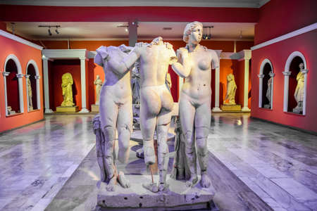 Antalya, Turkey - May 20, 2019: Marble statues of gods and emperors of antiquity in the Museum of...