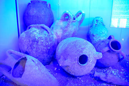 Antalya, Turkey - May 20, 2019: Ancient jugs and amphoras raised from the bottom of the sea. Antalya...