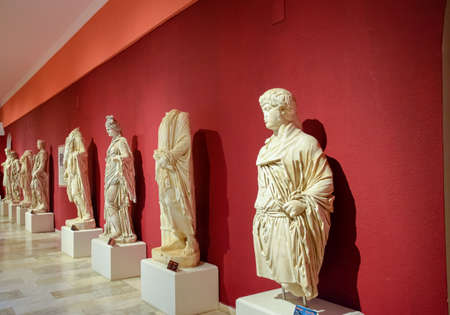 Antalya, Turkey - May 20, 2019: Marble statues of gods and emperors of antiquity in the Museum of...