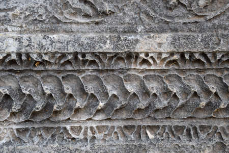 Background texture Vintage stones with patterns. Bas-relief on limestone and marble. Antique...