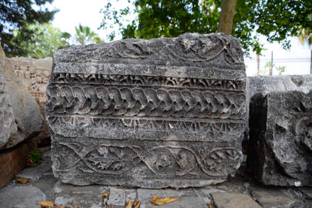 Vintage stones with patterns. Bas-relief on limestone and marble. Antique culture.