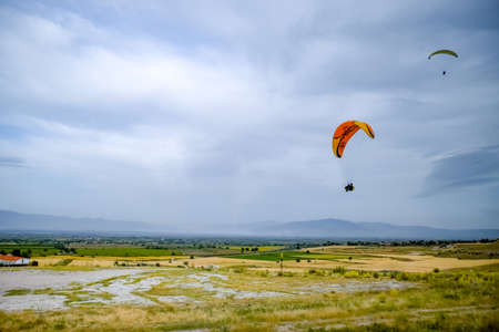 Demre, Turkey - May 22, 2019 Flying on the wing parachutingのeditorial素材