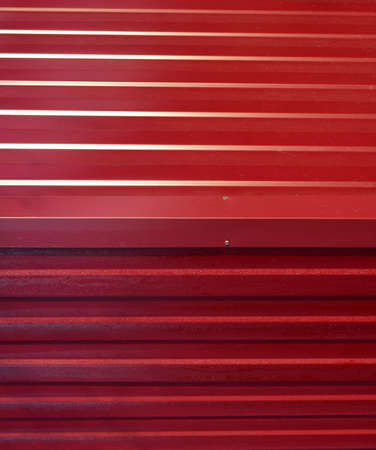 Diagonal pattern of metal profile. Fences from the galvanized iron painted by a polymeric covering.の写真素材