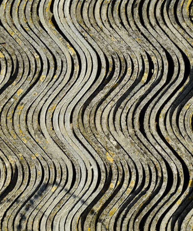 Corrugated slate lies in a pile, side view background texture of slateの写真素材