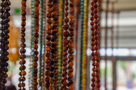 Indian beads and jewelry on the counter in the store.