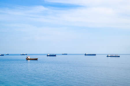 Cargo ships and barges at sea, a squadron of cargo ships. Tsemes Bay,