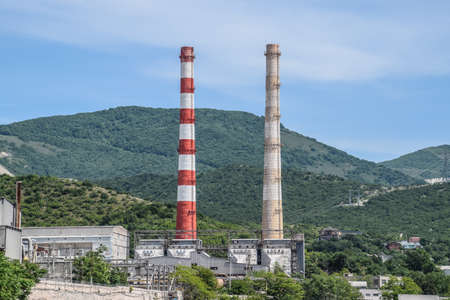 a Chimneys of factories. Two brick pipes.の写真素材
