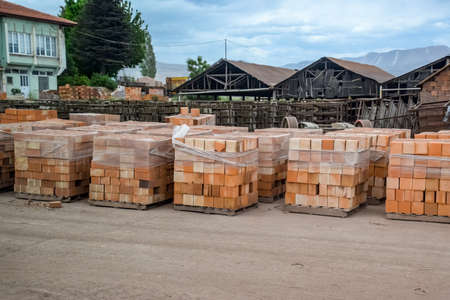 Warehouse of hollow ceramic bricks. Construction base.