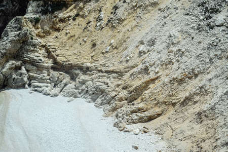 Coastal cliffs of limestone. The coast of the Mediterranean Sea in Turkey.