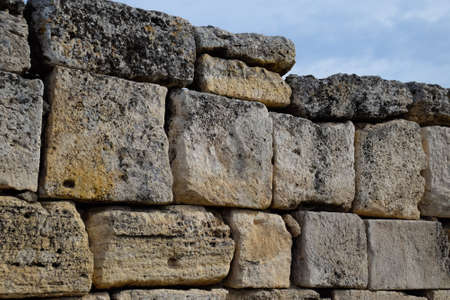 The walls of the ancient ruins of limestone blocks. Ruins of the city of Hierapolis, Turkey.の写真素材
