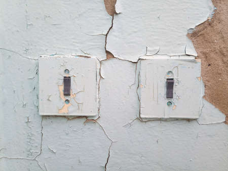 Switches on the old wall. Very old house and renovated.