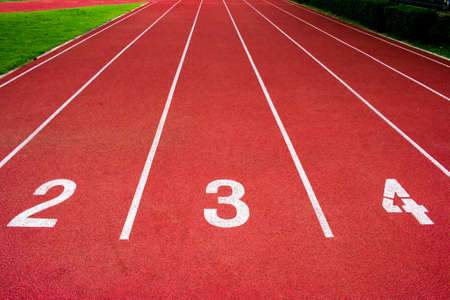 Red running track Synthetic rubber on the athletic stadium.の写真素材