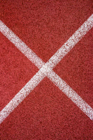 Red running track Synthetic rubber on the athletic stadium.