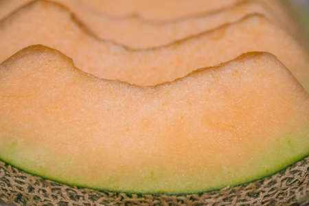 slices of cantaloupe melon closeupの写真素材