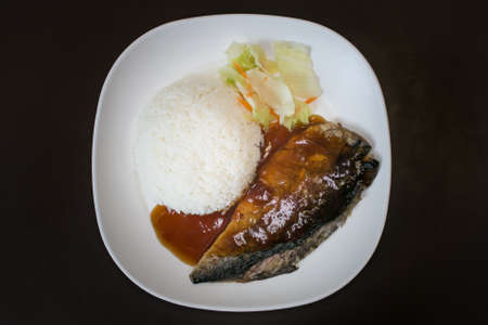 Grilled saba fish with sweet sauce and riceの写真素材