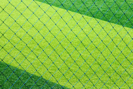 Green artificial grass soccer field for backgroundの写真素材