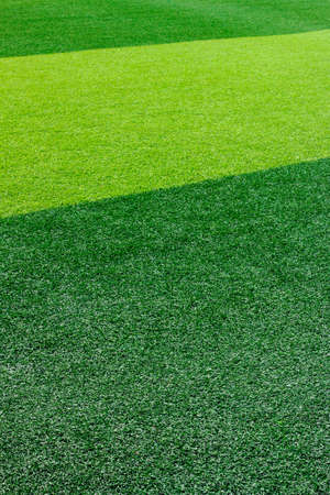 Green artificial grass soccer field for backgroundの写真素材