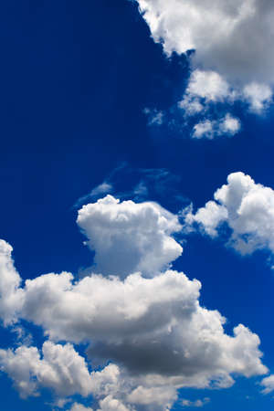 Bright blue sky with white clouds