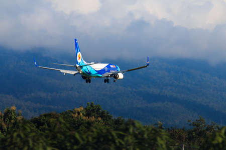 CHIANGMAI THAILAND - SEPTEMBER 2017 Nok Air airplane landing at Chiangmai international airport in Morning day on September 20,2017 in Chiangmai Thailandのeditorial素材