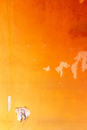 Abstract Old Yellow Grunge Cement Wall for texture backgroundの写真素材