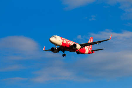 CHIANGMAI THAILAND - October 2017 Malaysia Airasia airplane landing at Chiangmai international airport in Afternoon day on October 21,2017 in Chiangmai Thailandのeditorial素材