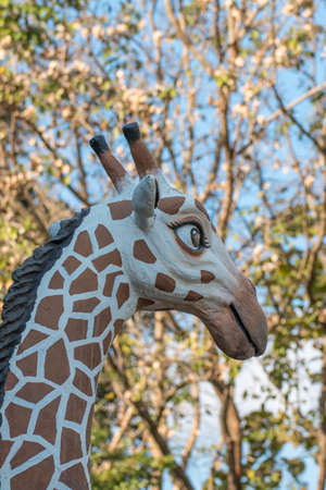 Long neck giraffe statue in Chiang Mai Night Safari ,Thailandの写真素材
