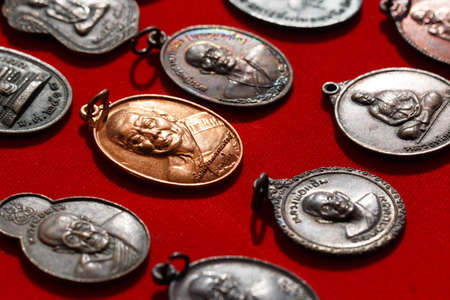 Small Buddha image or Thai amuletの写真素材