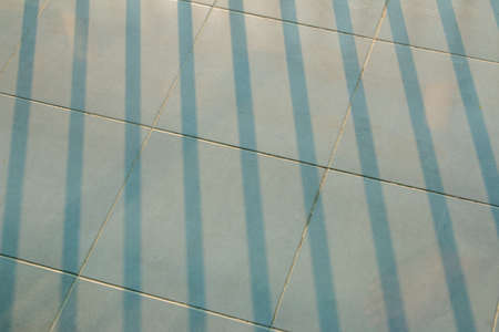 light green old tiled floorの写真素材
