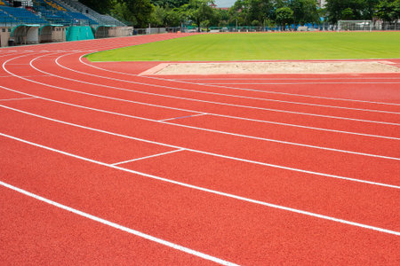 Red running track Synthetic rubber on the athletic stadiumの写真素材
