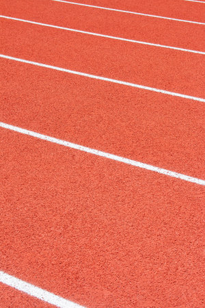 Red running track Synthetic rubber on the athletic stadiumの写真素材